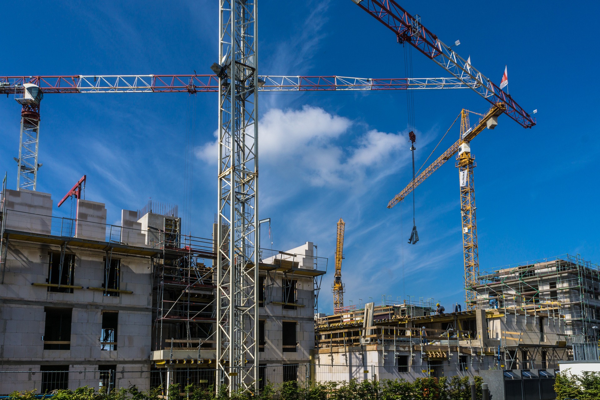 Construction site with heavy machinery and federal building projects